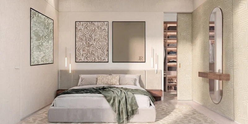 A furnished kitchen and dining room at Richmond Residences, the table set below a lit display cabinet